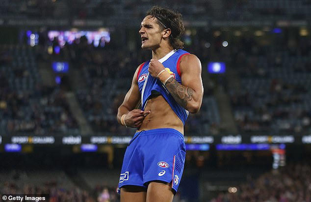 In March last year, Western Bulldogs AFL star Jamarra Ugle-Hagan (pictured) confirmed he was subjected to racist abuse by a St Kilda fan during a match.