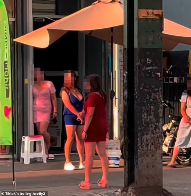 Prostitution is considered a Class B misdemeanor in New York, punishable by up to three months in jail and/or a fine of up to $500. Pictured: Workers on Roosevelt Avenue last year