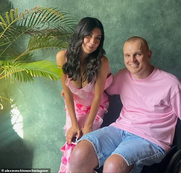 Alex McKinnon has posted a photo of himself and a mysterious new woman on social media