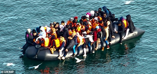 The boat was full of migrants, many of whom did not appear to be wearing life jackets