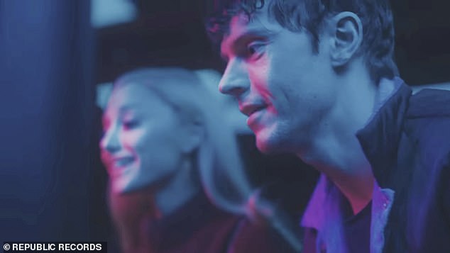 Ariana Grande has released the official music video for her new song 'we can't be friends, wait for your love' and shows off her chemistry with actor Evan Peters