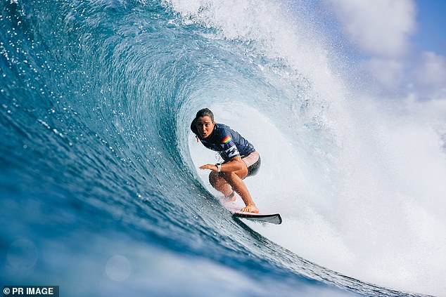 Two-time world surfing champion Tyler Wright (pictured at the Pipeline Break in Hawaii) will head to the Olympic Games in Paris later this year with seven screws in her head