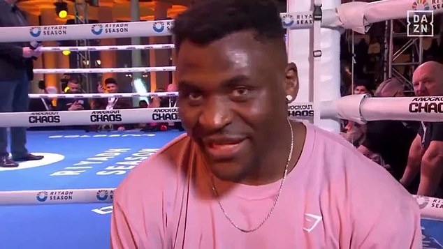 Francis Ngannou appeared to flirt with a reporter after his open training on Tuesday
