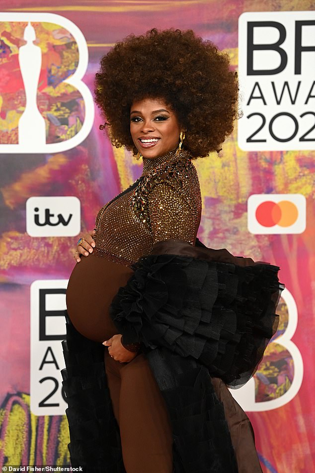 Heavily pregnant Fleur East, 36, stunned in tan and wore a huge afro at the 2024 BRIT Awards in London on Saturday