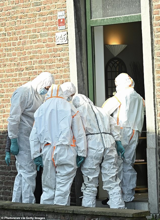 A forensic team visits the house in the suburb of Lodelinsart, Charleroi