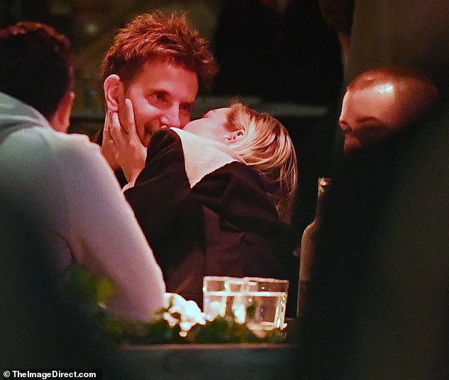 Bradley Cooper and Gigi Hadid put their relationship on edge as they dined with friends in New York on Thursday