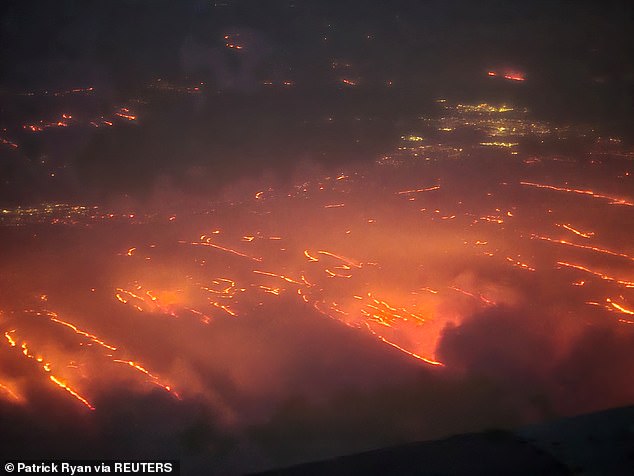 Texas wildfires have collectively burned more than 1.1 million acres.  An aerial photo shows Tuesday's terrifying inferno