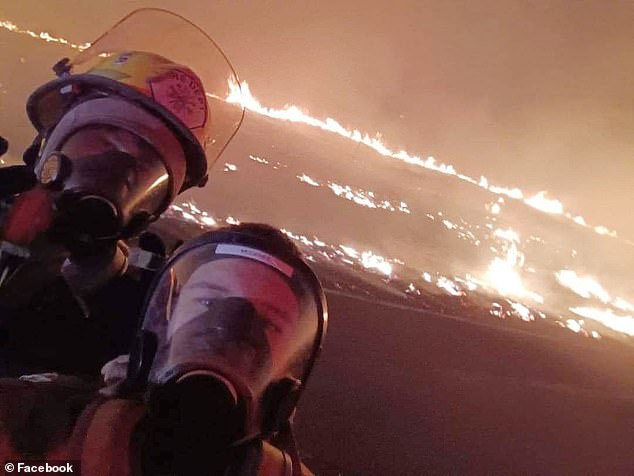 Brave teenage firefighters stood up to the flames as the largest wildfire in Texas history continues to devastate the Panhandle country under critical firefighting conditions.  Pictured: Nathan Slater (left) and Gage Hardman (right)