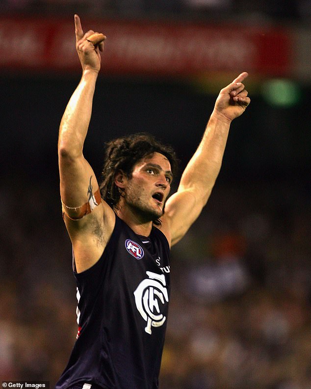 Brendan Fevola (pictured playing for the Blues in 2005) has been inducted into Carlton's Hall of Fame in what he describes as the pinnacle of his football career