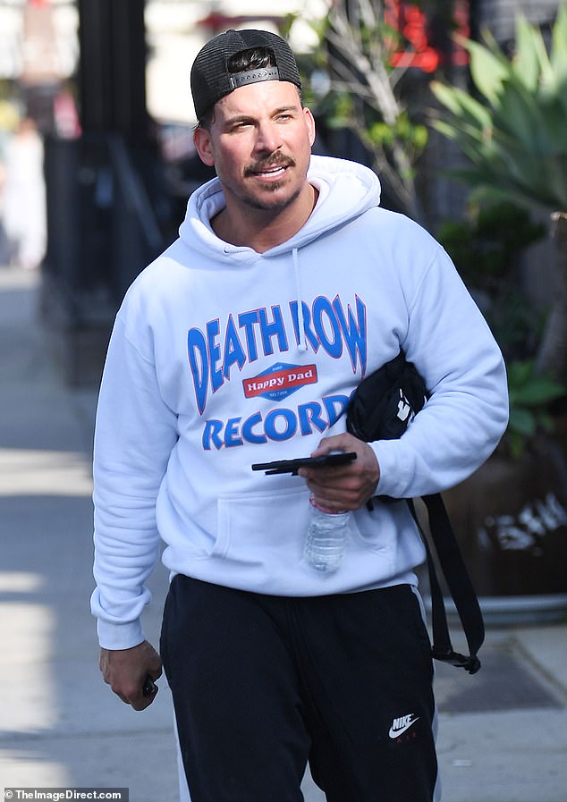 While entering his sports bar, Jax's Bar, in Los Angeles, the reality star, 35, and father of one, 44, wore the colors of the Kentucky Wildcats, blue and white