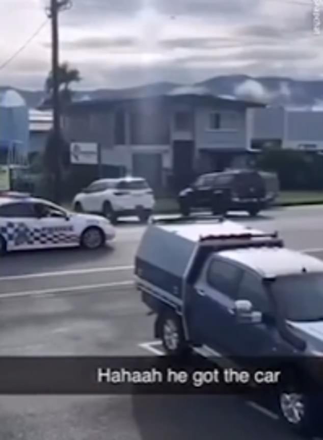 Dramatic footage shows the 21-year-old man driving down the road in a stolen police car (photo)