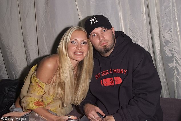 Caprice revealed Limp Bizkit's Fred Durst secretly flew her to LA first class after meeting her at the 2001 MTV Awards - where they 'talked and vibed all night' - pictured at the event