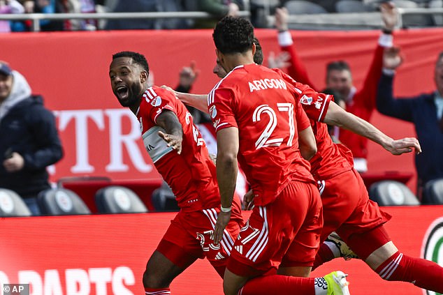 Kellyn Acosta set up a wind-induced tiebreak goal from midfield in the closing stages