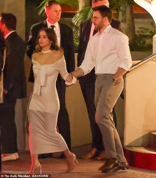 Chris Evans, 42, was spotted sweetly holding hands with his wife, Alba Baptista, 26, as the couple left a pre-Oscars party at the Sunset Tower Hotel in West Hollywood on Friday.