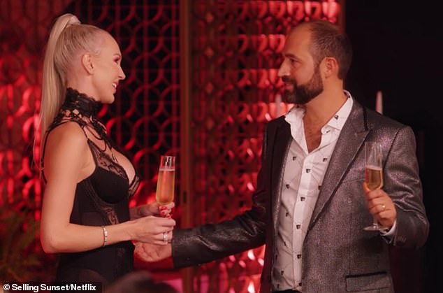 The couple tied the knot in December 2019 in an unconventional Gothic, winter wonderland-themed wedding at a cathedral in downtown Los Angeles (pictured at their engagement party)