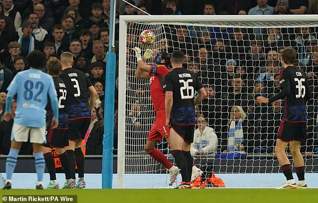 Kamil Grabara got off to a poor start as he let Julian Alvarez's shot slip through his fingers for Manchester City's second goal after nine minutes.