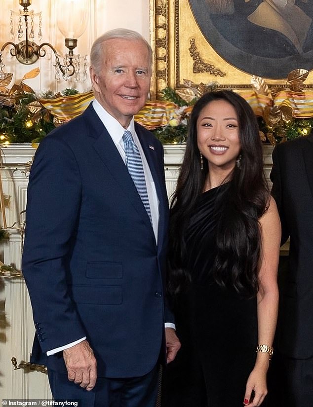 Tiffany Fong poses with President Joe Biden in December 2022