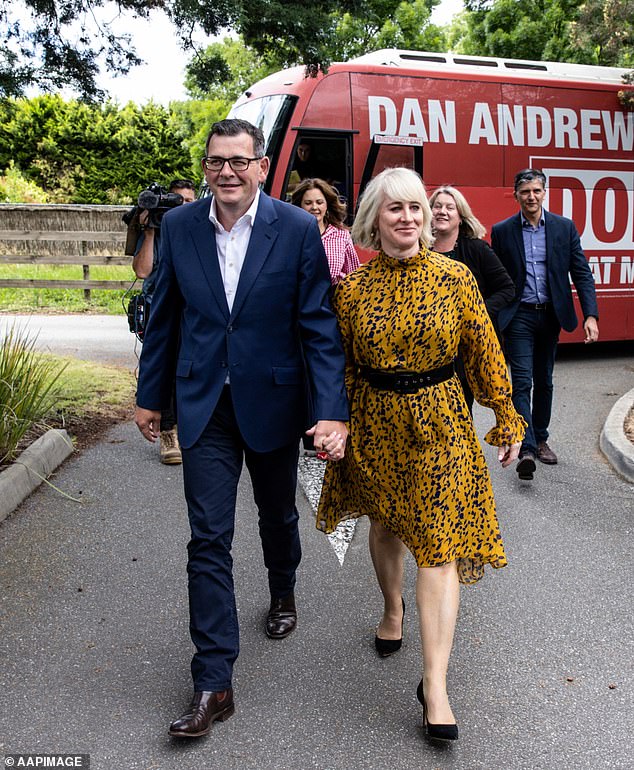 Former Victorian Premier Dan Andrews has been ordered to hand over his phone and credit card details in relation to a 2013 accident involving a cyclist while he was in the passenger seat and his wife Catherine was driving (pictured together)