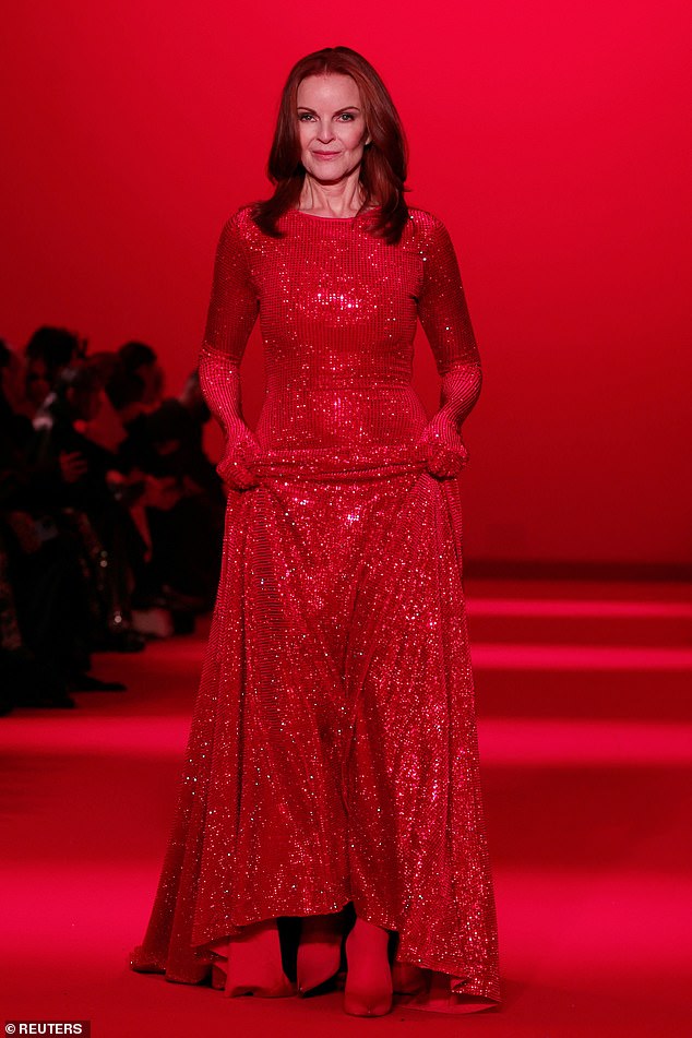 Marcia Cross was a vision in red as she walked the catwalk at the Vetements Fall/Winter show on Friday as part of Paris Fashion Week