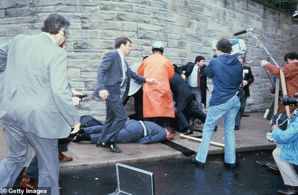 Chaos Surrounds Shooting Victims Immediately Following the Assassination of President Reagan, March 30, 1981, by John Hinckley Jr.  outside the Hilton Hotel in DC