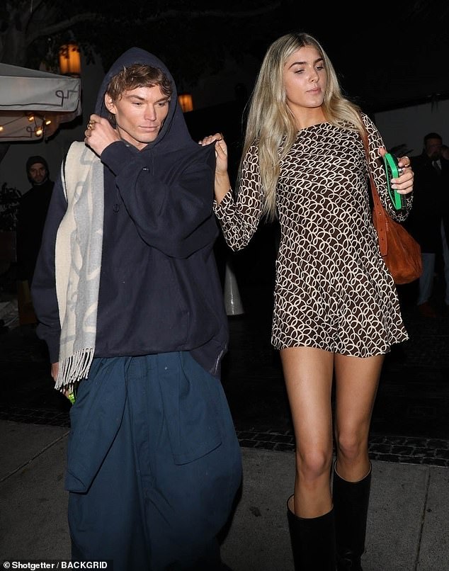 Jordan Barrett, 26, (left) continued to worry about his extreme weight loss on Saturday when the pre-Oscar party at Chateau Marmont looked very thin.  (Pictured with a friend)