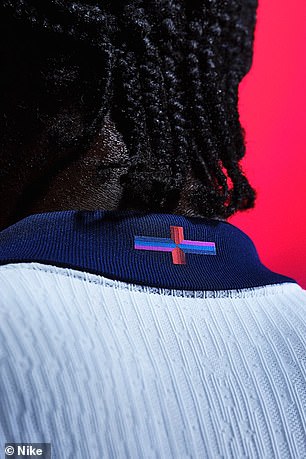 The changes to the St. George's Cross introduced by Nike, which added navy blue, light blue and purple to the traditional red cross, were approved by Singh in the summer of 2022.