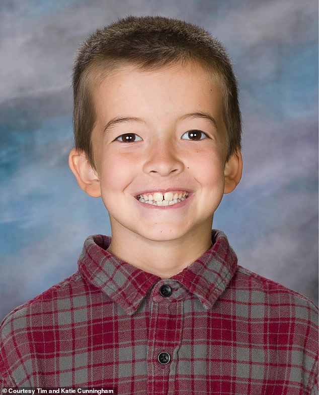 Dallin Cunningham, 8, died after falling from a corkscrew slide on his elementary school playground