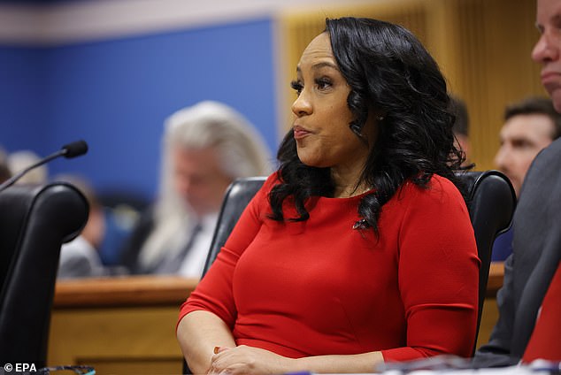 A new filing from Donald Trump's lawyers accuses Fulton Count DA of playing the 'race card' when she said the charges against her were politically motivated and said they targeted her ex-boyfriend, Special Prosecutor Nathan Wade because of his race