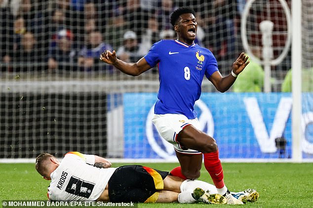 Toni Kroos bumped into clubmate Aurelien Tchouameni during France-Germany