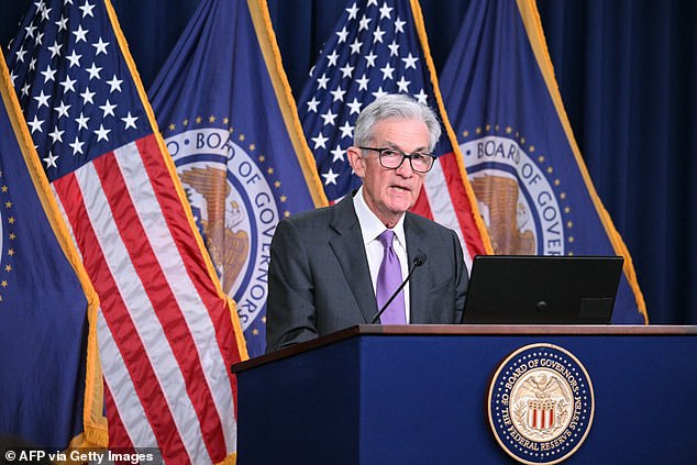 The Federal Reserve posted a record loss of $114.3 billion in 2023 as it struggled to meet its short-term interest rate target.  Pictured: Fed Chairman Jerome Powell at the body's meeting in March