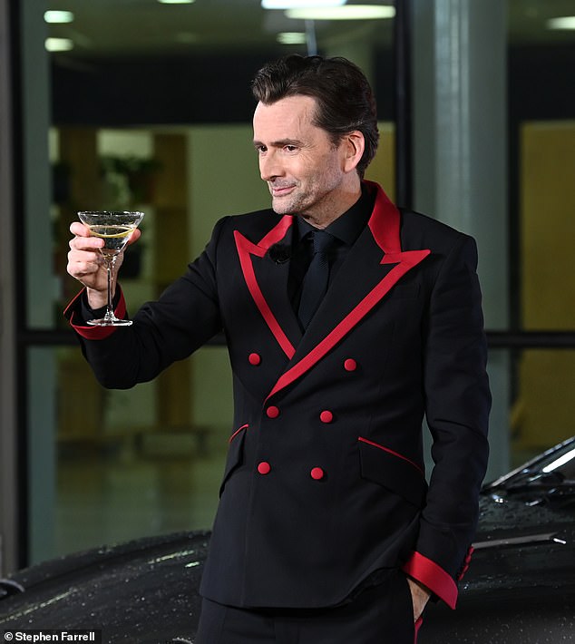 Finally the new 'Bond' is revealed!  Former Dr Who star David Tennant looked smart as he sipped a martini as the actor transforms into the 007 spy for Comic Relief skit on Friday