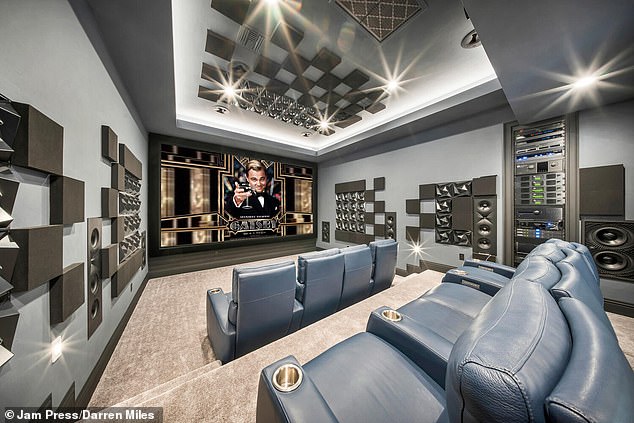 The home theater features sumptuous bison leather seating