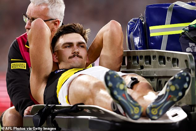 Footy fans are up in arms over Channel Seven's use of an on-field gimmick that was seen on television screens during the Richmond versus Carlton thriller at the MCG (pictured, Tigers defender Josh Gibcus)