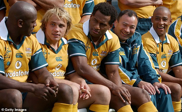 Tuqiri (pictured center during his Wallabies days) called on Roosters coach Trent Robinson to put forward a stronger view on the issue