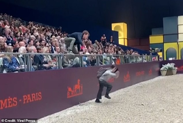 A pair of demonstrators (photo), involved with the environmental group Riposte Alimentaire, jumped over barriers during the Saut Hermes 2024