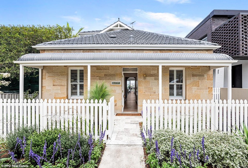 Behind the doors of a quaint historic cottage in one of Sydney's most sought-after suburbs hides an epic three-storey mansion with a lavish master suite and stunning views