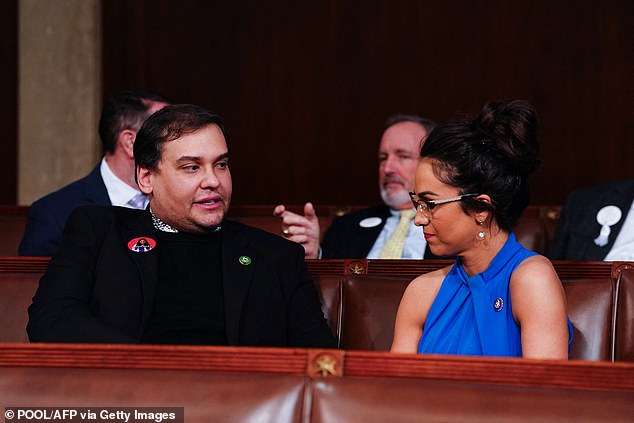 Republican fabulist George Santos has made a dramatic return to the Capitol three months after being deported.  He sat next to Lauren Boebert