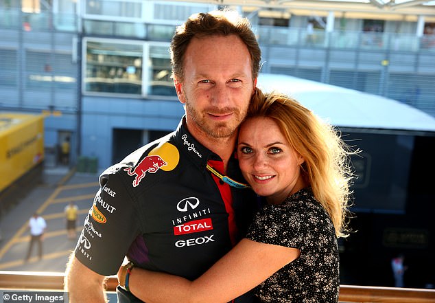 Red Bull team boss Christian Horner and Spice Girl Geri Halliwell pose after the F1 Grand Prix of Italy at Autodromo di Monza on September 7, 2014