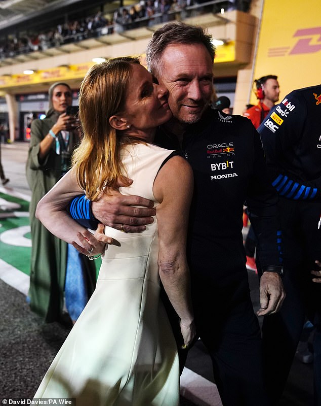 The former Spice Girl celebrates with Horner after Red Bull scored a memorable one-two in Bahrain