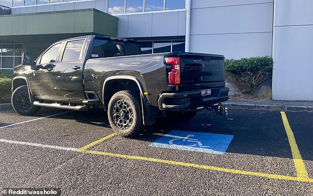 A photo shared on Reddit shows a giant Chevrolet SUV taking up three spaces, including a handicap spot, in a Melbourne parking lot on Saturday