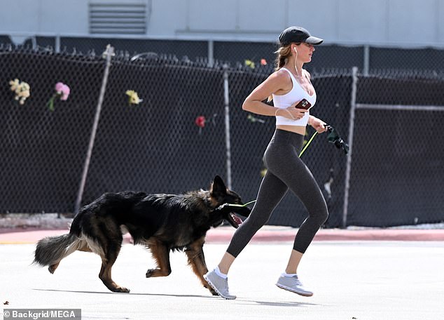 The cover model and her German Shepherd also seemed to burn off some energy with a quick jog