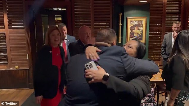 Steve Nikoui, the father of slain Lance Cpl.  Kareem Nikoui receives a hero's welcome at the Dubliner pub on Capitol Hill after being released following his arrest for harassing Biden during the State of the Union