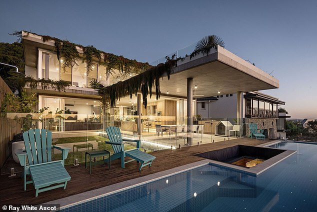 Some of Australia's wealthiest citizens are at war over the proposed renovation of 38 Eldernell Terrace (pictured) on Brisbane's Millionaires' Row