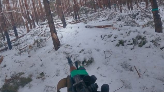Ghostly footage captured by a Ukrainian soldier shows the tense moment he shot a Russian lurking in a forest in Kupyansk, Ukraine