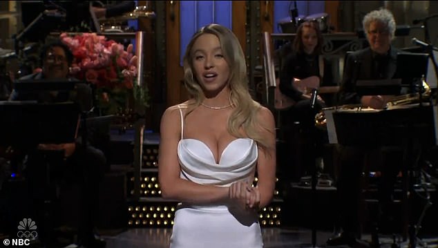 Sydney Sweeney hilariously shut down rumors of an 'affair' with her rom-com co-star Glen Powell in her SNL monologue by showing off her 'fiance' in the crowd