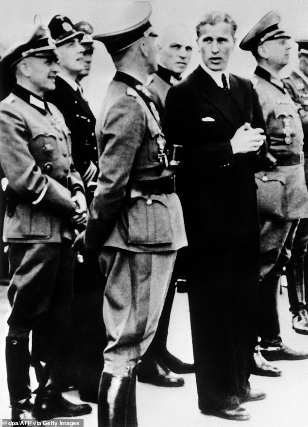 Wernher von Braun meets Nazi Wehrmacht officers during a demonstration for the launch of the V-2 rocket, scheduled for June 20, 1944. He became a key figure in America's victory in the space race.