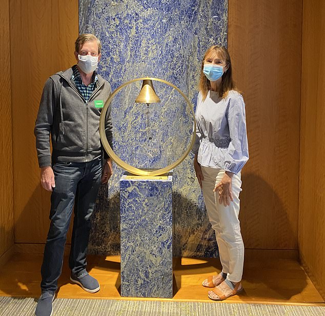 Mr Potts and his wife ring the bell to mark his final chemotherapy session in March 2021