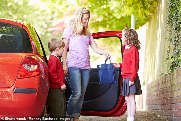 Getting your child to school safely and on time is every parent's priority and negotiating in traffic is often a daily struggle (stock image)