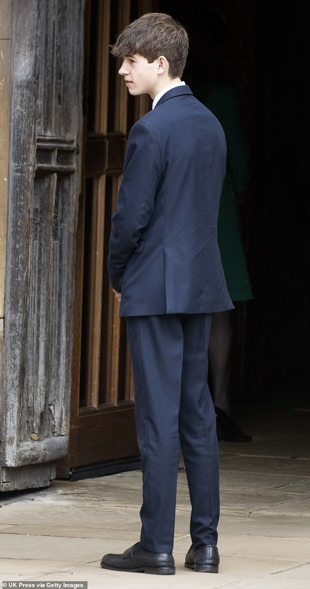 Looking smart, James opted for a navy blue suit which he teamed with a light blue tie and a crisp white shirt, along with black polished shoes