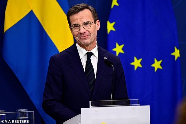 Swedish Prime Minister Ulf Kristersson speaks during a press conference at government headquarters in Stockholm, Sweden